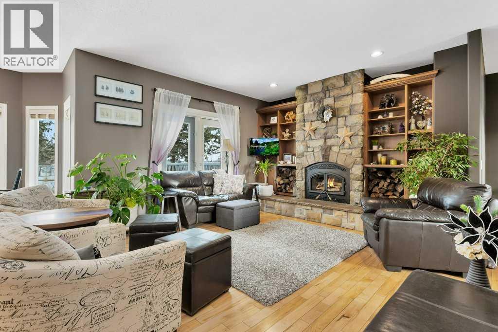 35276 Range Road 10 - 110, Rural Red Deer County, AB - Indoor Photo Showing Living Room With Fireplace