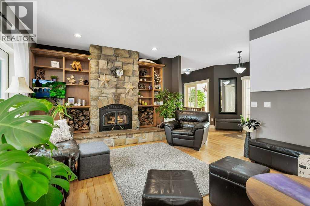 35276 Range Road 10 - 110, Rural Red Deer County, AB - Indoor Photo Showing Living Room With Fireplace
