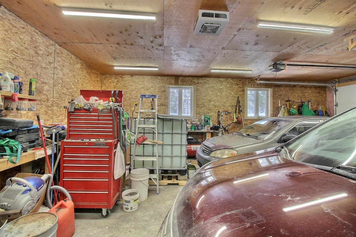 Garage - 116 Ch. Des Pins, Lambton, QC - Indoor Photo Showing Garage