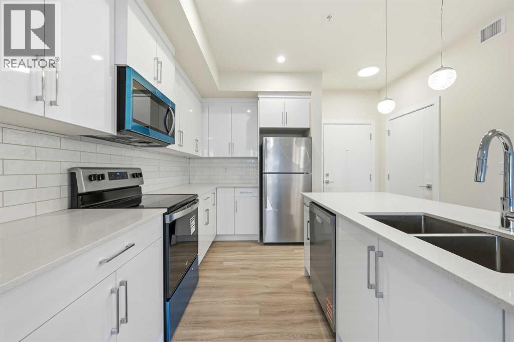 2221, 15 Skyview Point Crescent Ne, Calgary, AB - Indoor Photo Showing Kitchen With Stainless Steel Kitchen With Double Sink With Upgraded Kitchen