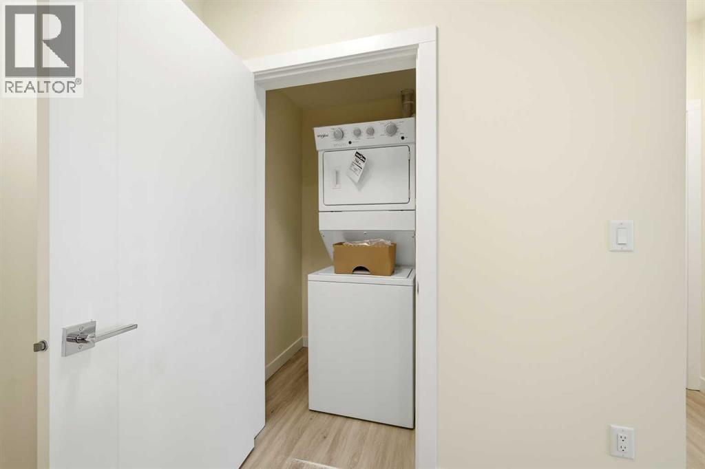 2221, 15 Skyview Point Crescent Ne, Calgary, AB - Indoor Photo Showing Laundry Room