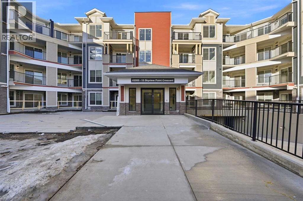 2221, 15 Skyview Point Crescent Ne, Calgary, AB - Outdoor With Balcony With Facade