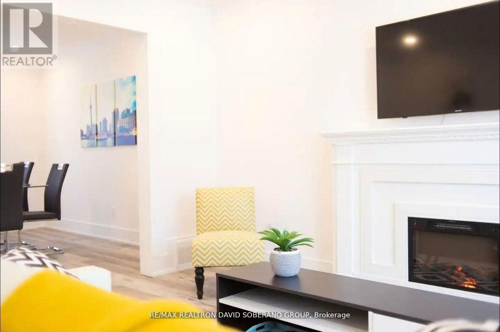 55 Raeburn Avenue, Toronto, ON - Indoor Photo Showing Living Room With Fireplace