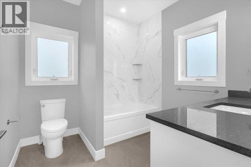 2016 30 Avenue, Nanton, AB - Indoor Photo Showing Bathroom