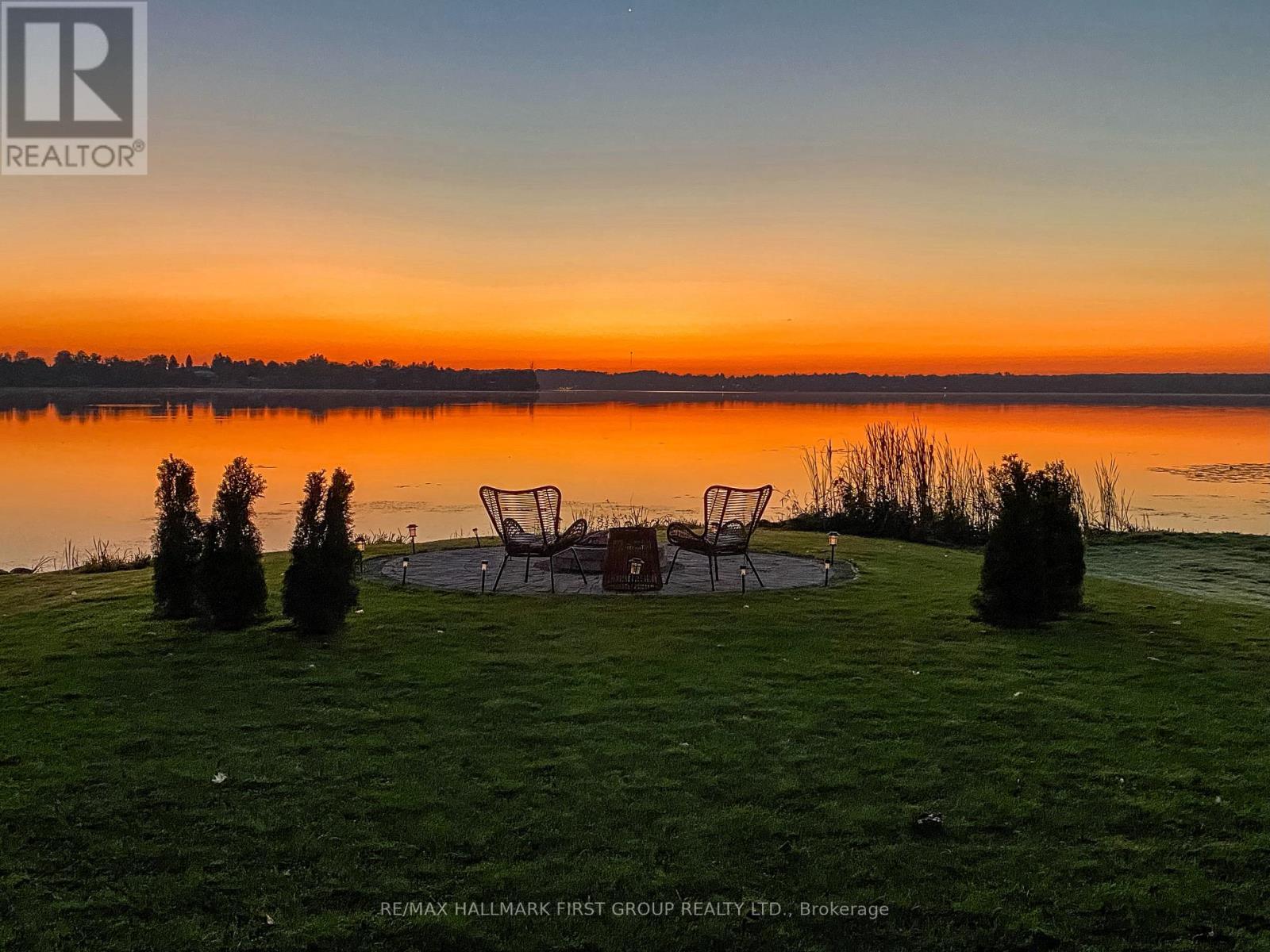 Captivating Sunrise Views - 61 Druan Drive, Kawartha Lakes (Mariposa), ON - Outdoor With Body Of Water With View