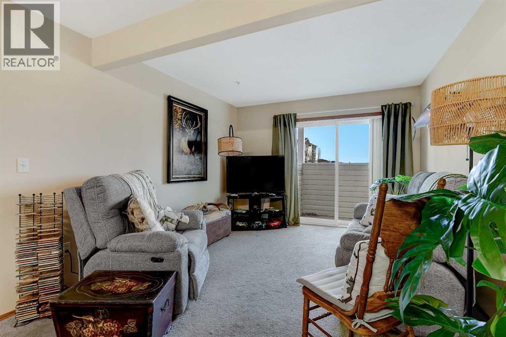 206, 12015 Royal Oaks Drive, Grande Prairie, AB - Indoor Photo Showing Living Room