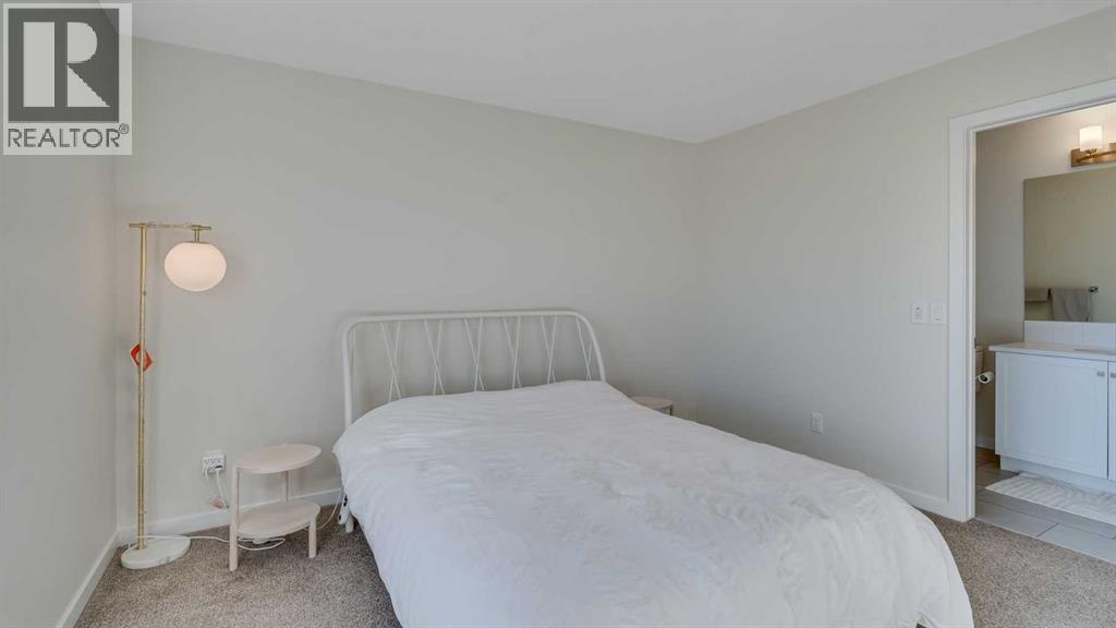 18 Amblehurst Path Nw, Calgary, AB - Indoor Photo Showing Bedroom