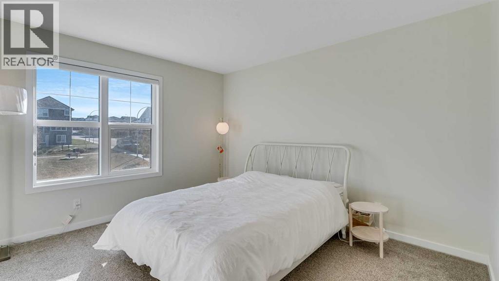 18 Amblehurst Path Nw, Calgary, AB - Indoor Photo Showing Bedroom