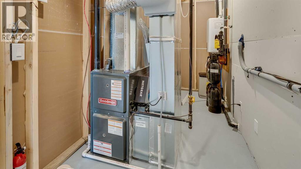 18 Amblehurst Path Nw, Calgary, AB - Indoor Photo Showing Basement