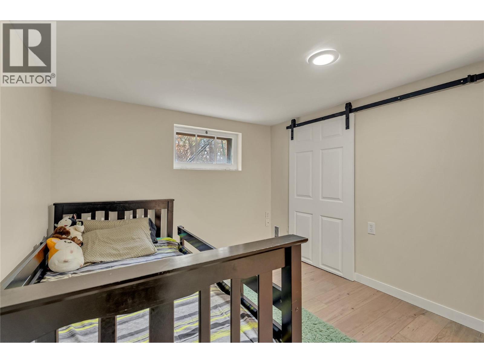 Lower Level Bedroom - 796 Chase Avenue, Penticton, BC - Indoor Photo Showing Bedroom