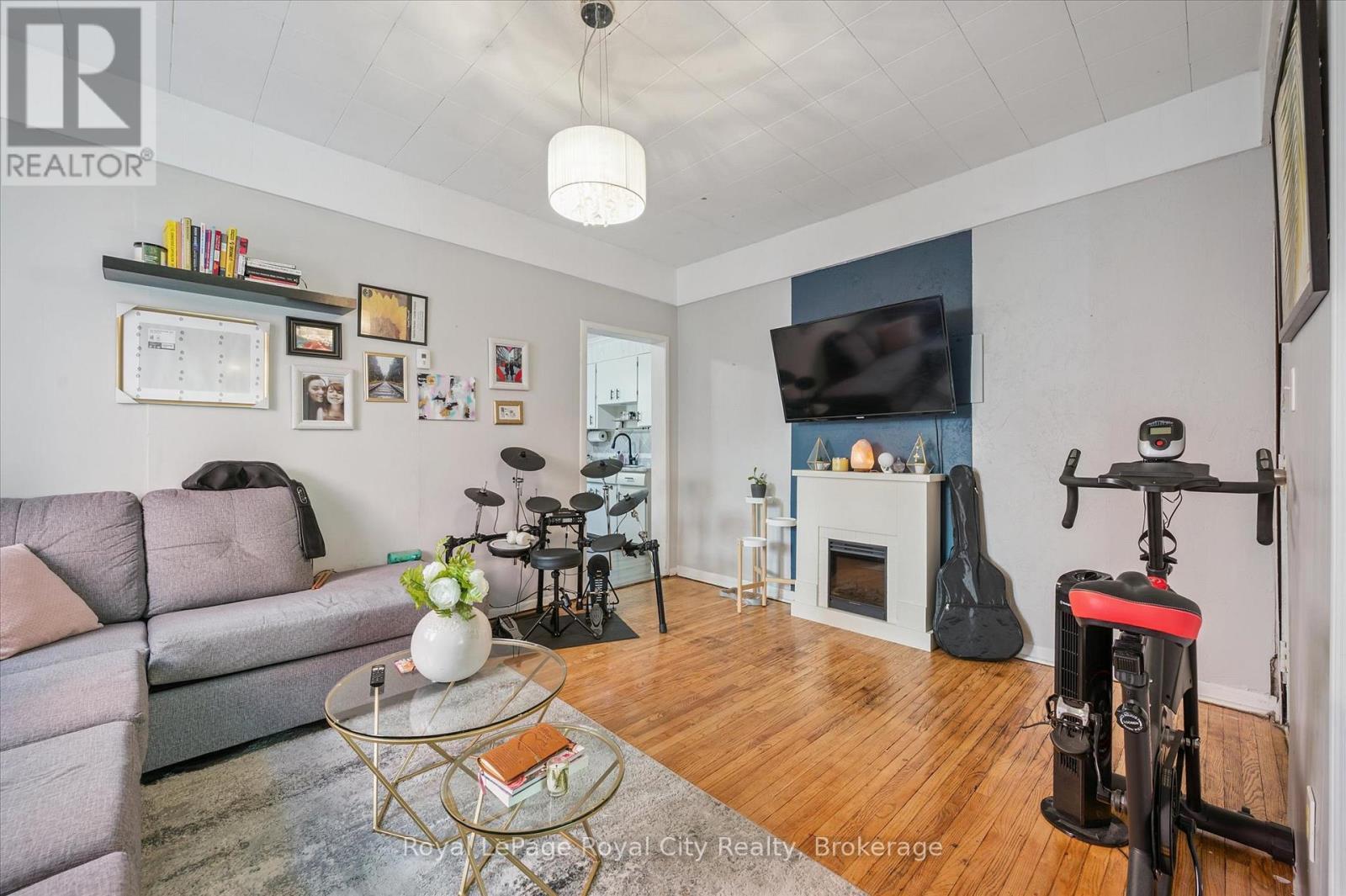 Unit 1 - 148 Suffolk Street W, Guelph (Downtown), ON - Indoor Photo Showing Living Room With Fireplace