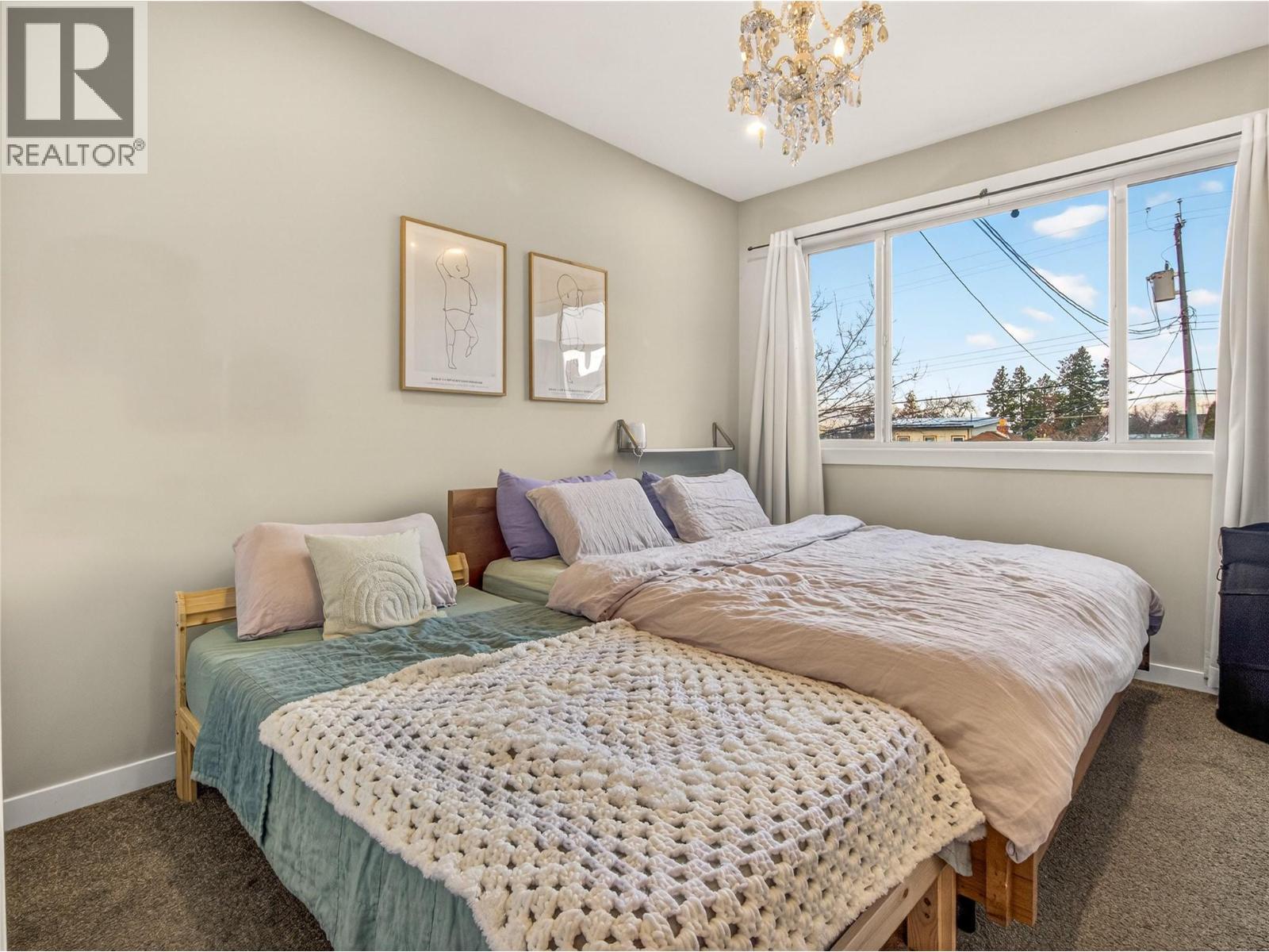 102 Cossar Avenue Unit# 103, Penticton, BC - Indoor Photo Showing Bedroom