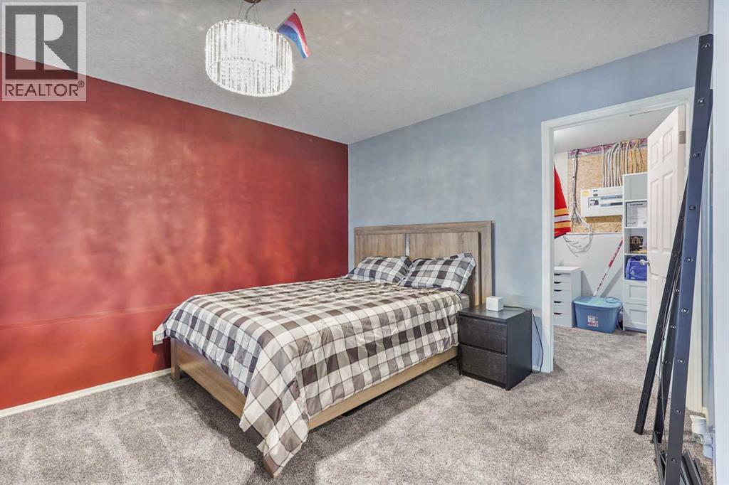 95048 River Ridge Road, Rural Lethbridge County, AB - Indoor Photo Showing Bedroom