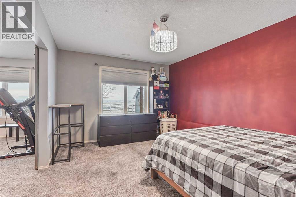 95048 River Ridge Road, Rural Lethbridge County, AB - Indoor Photo Showing Bedroom