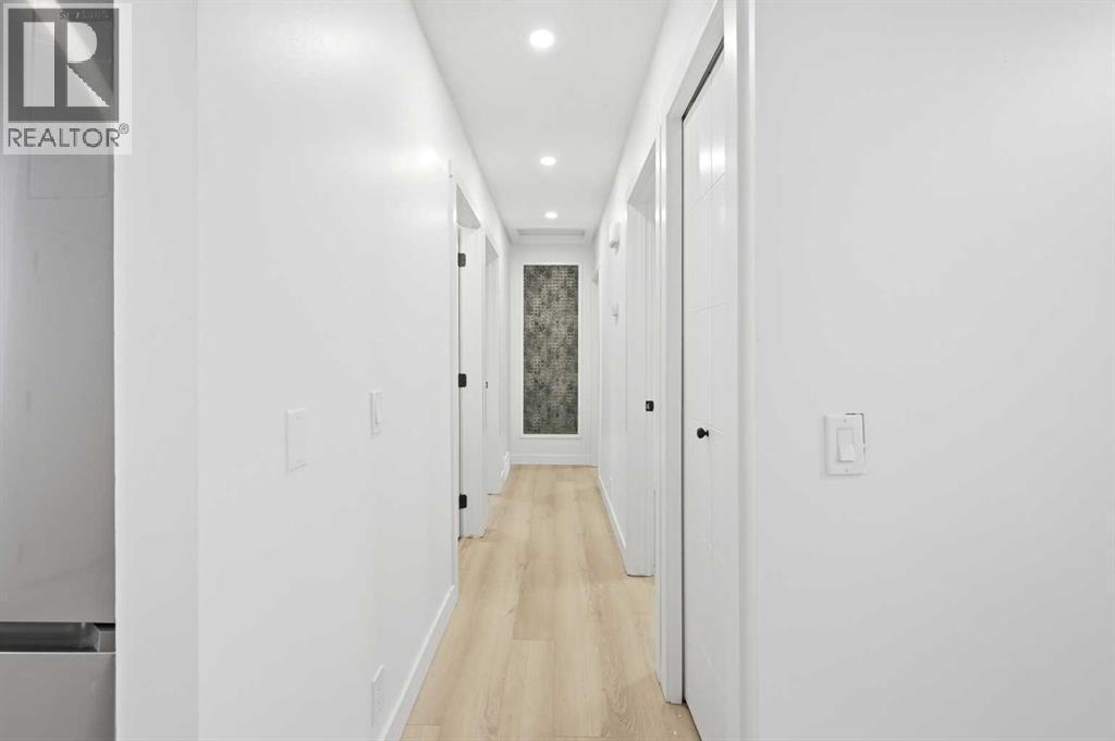 Hallway - main - 2404 51 Street Ne, Calgary, AB - Indoor Photo Showing Other Room