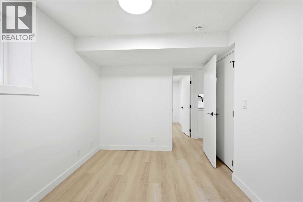 Primary washroom basement - 2404 51 Street Ne, Calgary, AB - Indoor Photo Showing Other Room