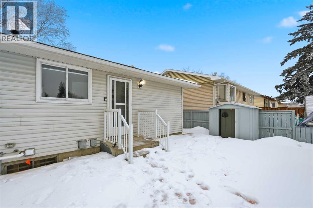 Backyard - 2404 51 Street Ne, Calgary, AB - Outdoor With Exterior