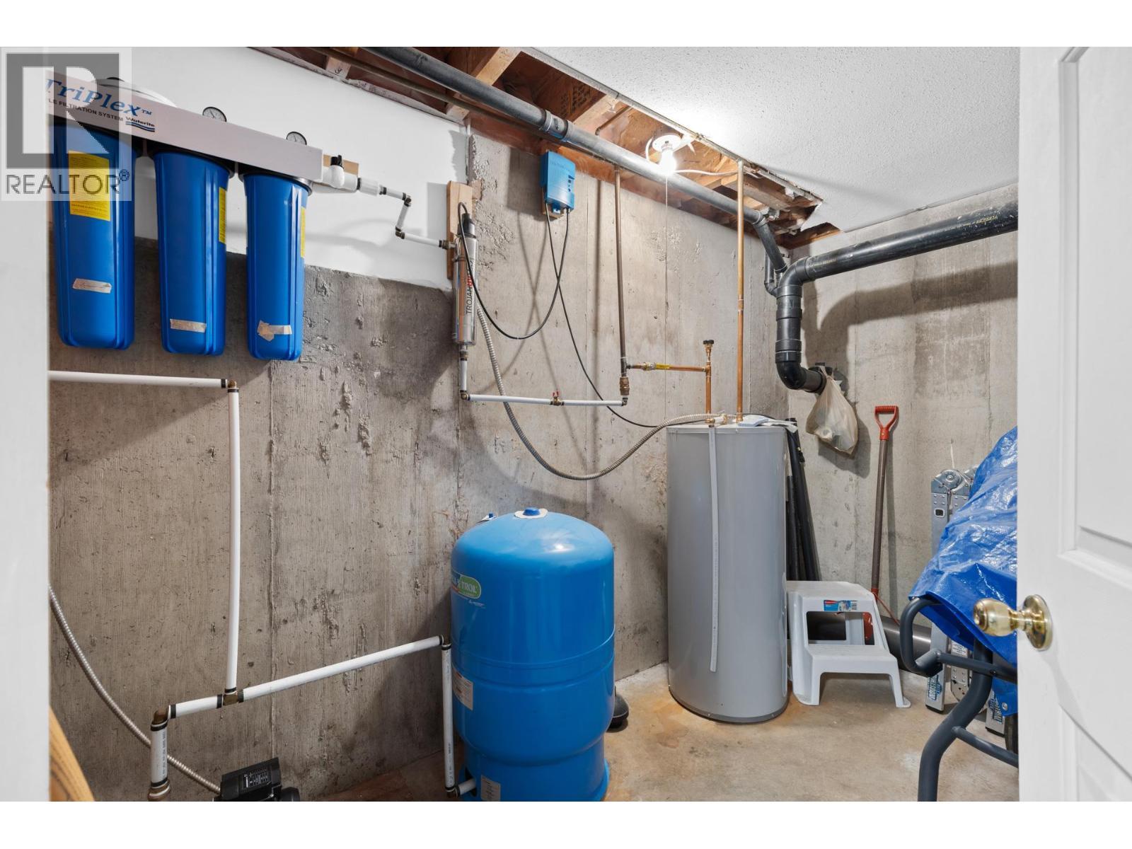 Water filtration system - 9245 Paradise Road, Kelowna, BC - Indoor Photo Showing Basement