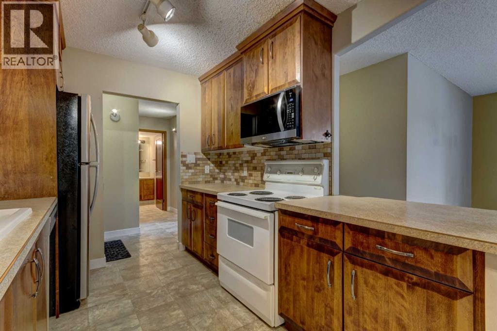207, 111 14 Avenue Se, Calgary, AB - Indoor Photo Showing Kitchen