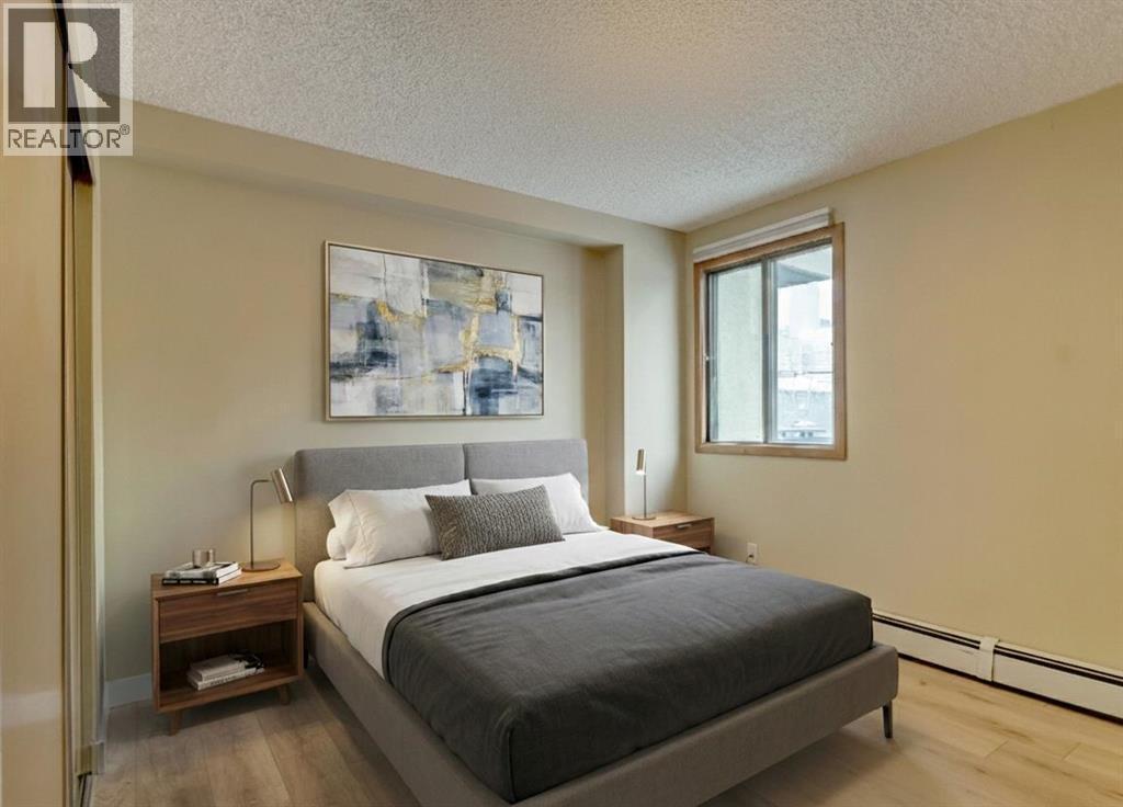 207, 111 14 Avenue Se, Calgary, AB - Indoor Photo Showing Bedroom