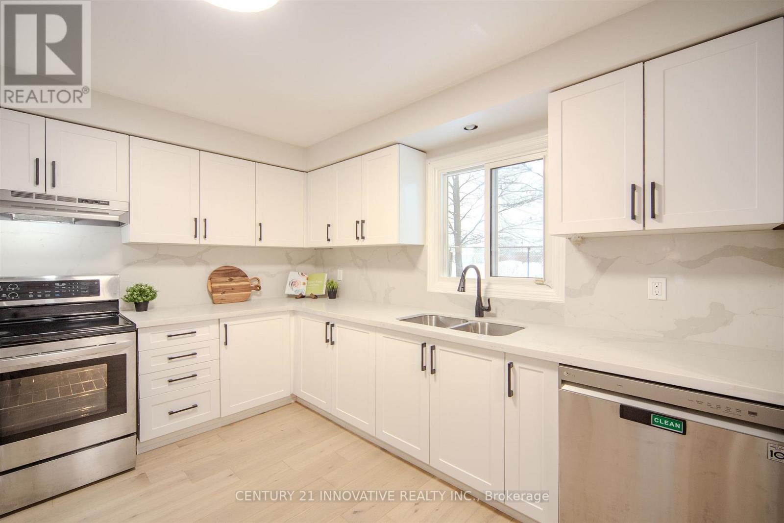 20 Muirbank Boulevard, Toronto, ON - Indoor Photo Showing Kitchen With Stainless Steel Kitchen With Double Sink