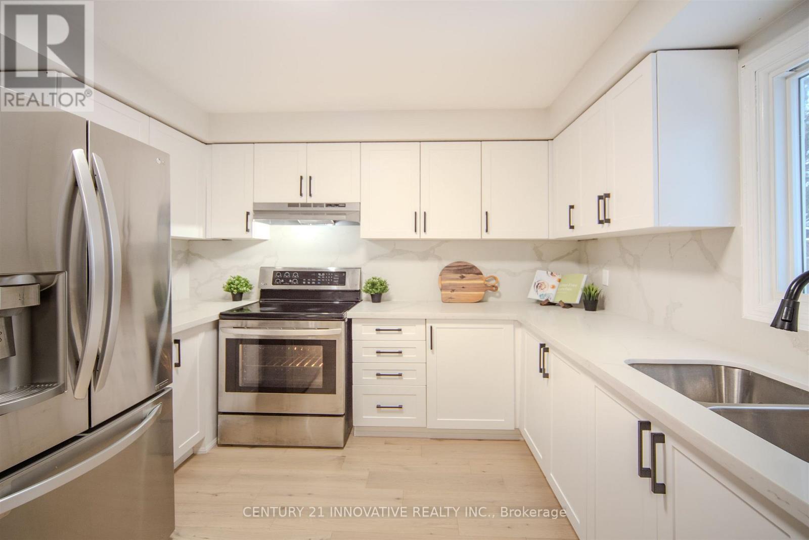 20 Muirbank Boulevard, Toronto, ON - Indoor Photo Showing Kitchen With Stainless Steel Kitchen With Double Sink