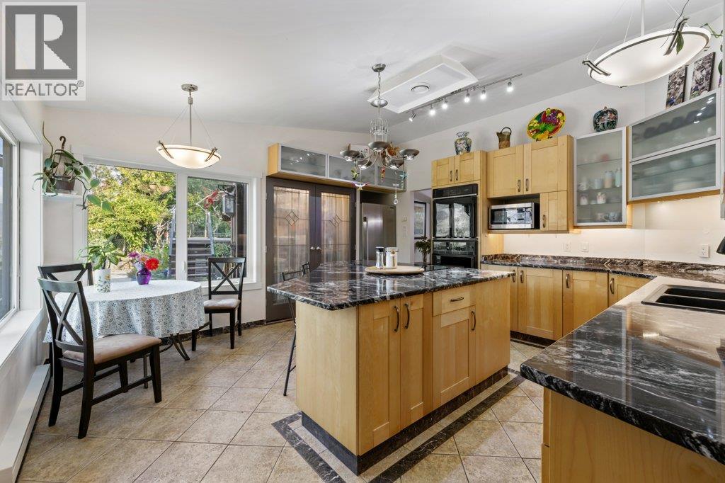 Phenomenal chefs kitchen with ample lighting. - 2245 Bennett Road, Kelowna, BC - Indoor Photo Showing Kitchen With Double Sink With Upgraded Kitchen
