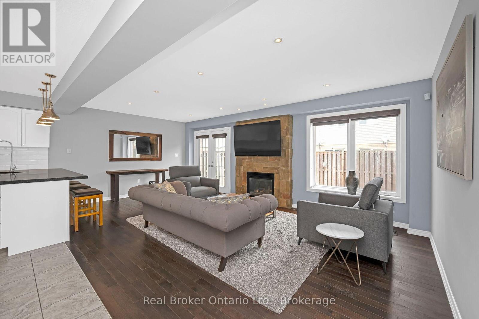 23 Bellflower Boulevard, Hamilton, ON - Indoor Photo Showing Living Room With Fireplace