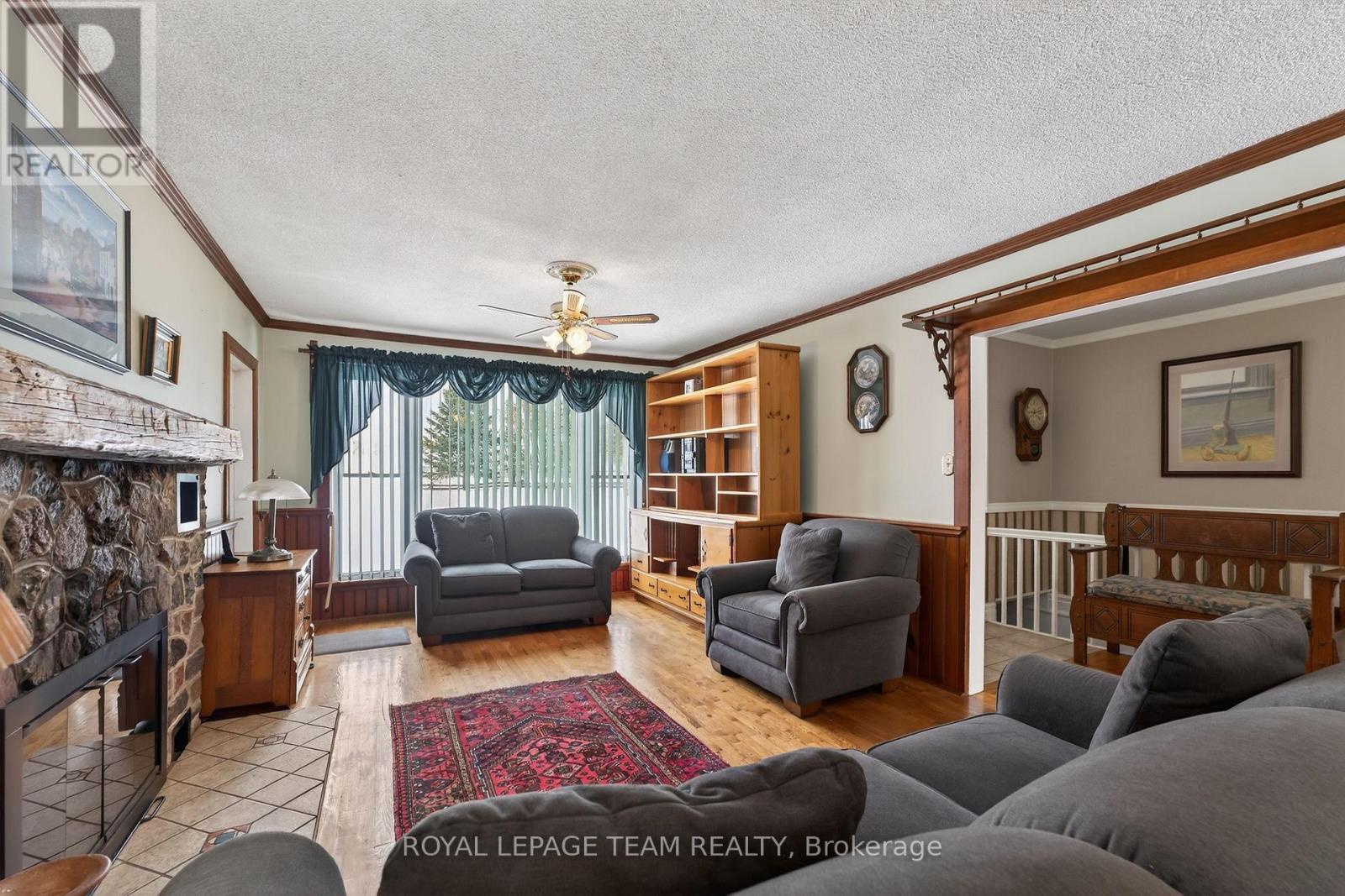 2377 Ramsay Con 7B Avenue S, Mississippi Mills, ON - Indoor Photo Showing Living Room With Fireplace