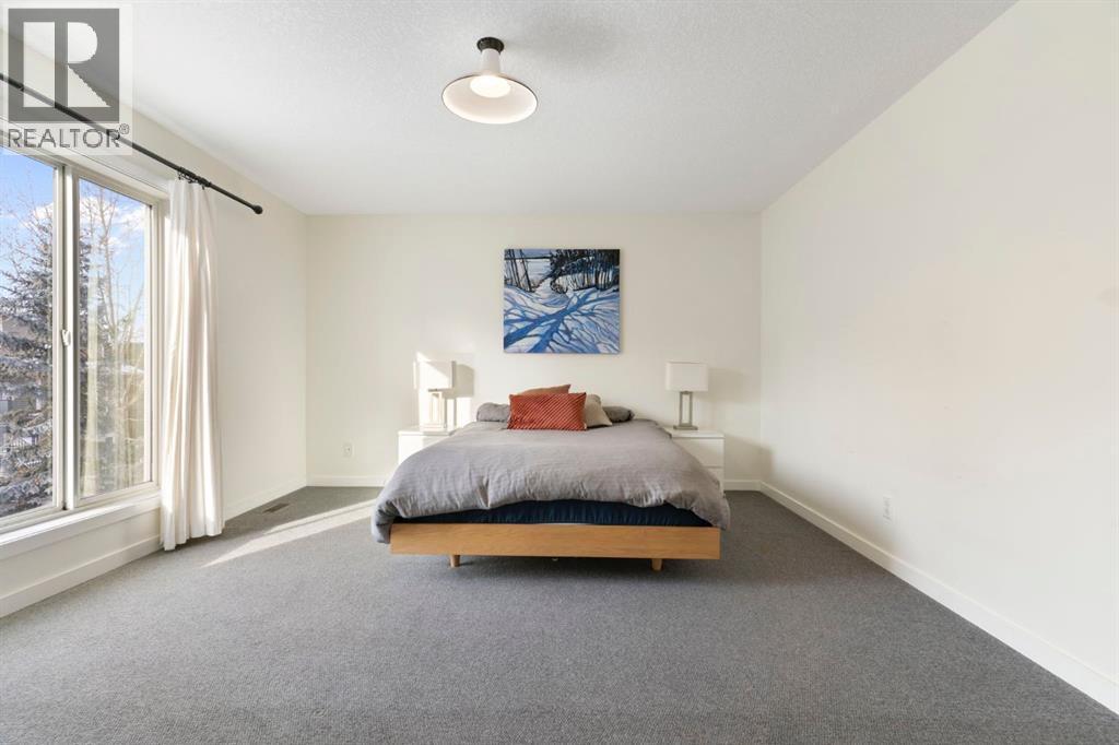 196 Jumping Pound Terrace, Cochrane, AB - Indoor Photo Showing Bedroom