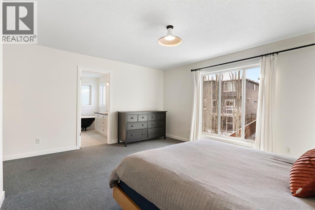 196 Jumping Pound Terrace, Cochrane, AB - Indoor Photo Showing Bedroom