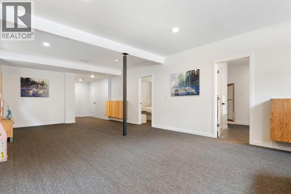 196 Jumping Pound Terrace, Cochrane, AB - Indoor Photo Showing Other Room