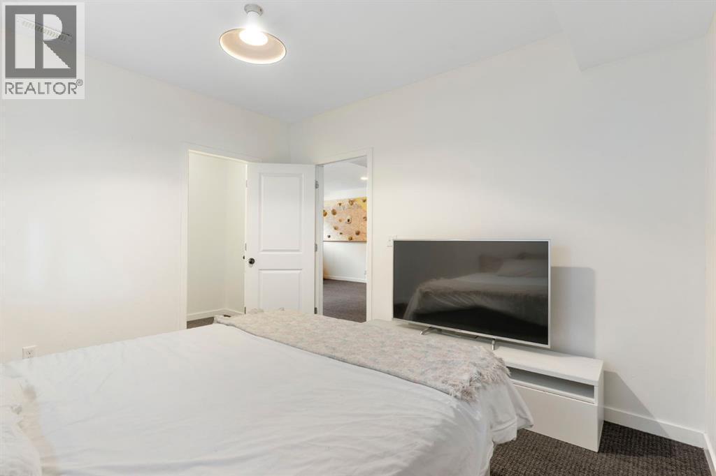 196 Jumping Pound Terrace, Cochrane, AB - Indoor Photo Showing Bedroom