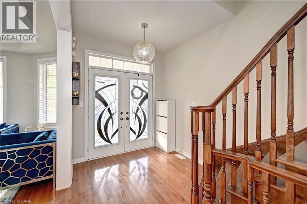 Entryway with hardwood / wood-style flooring, french doors, and stairs - 32 Weir Street, Cambridge, ON - Indoor Photo Showing Other Room