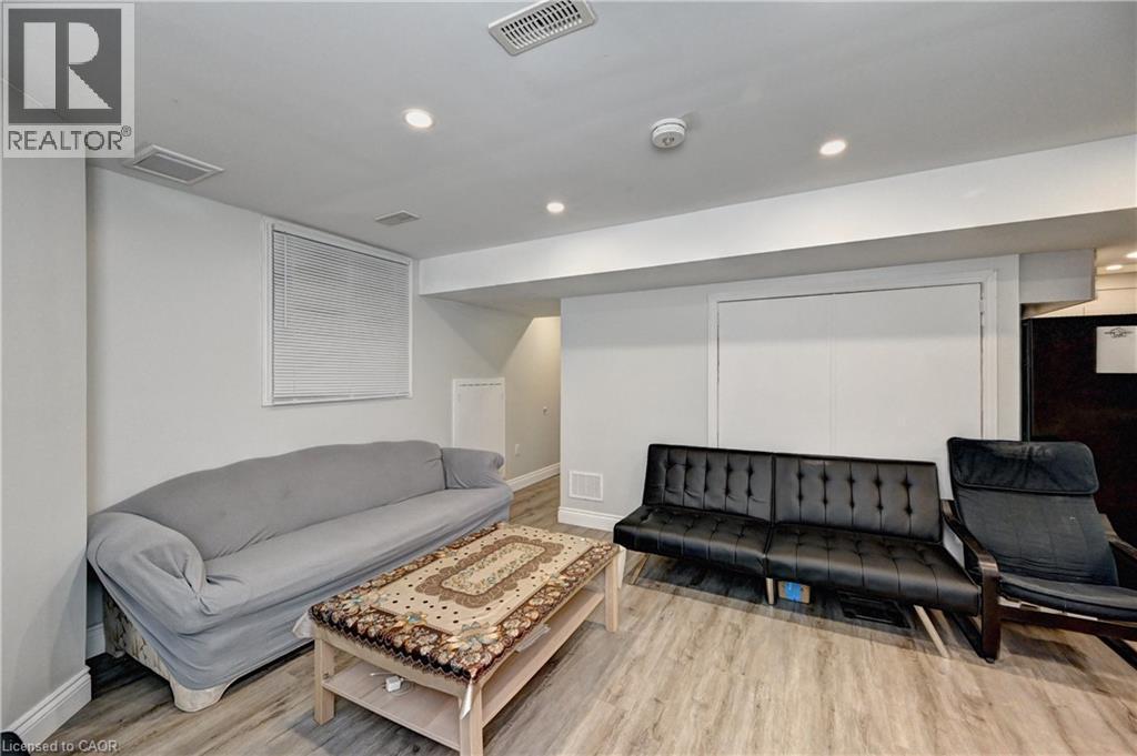 Living area featuring recessed lighting and light wood-style floors - 32 Weir Street, Cambridge, ON - Indoor Photo Showing Living Room