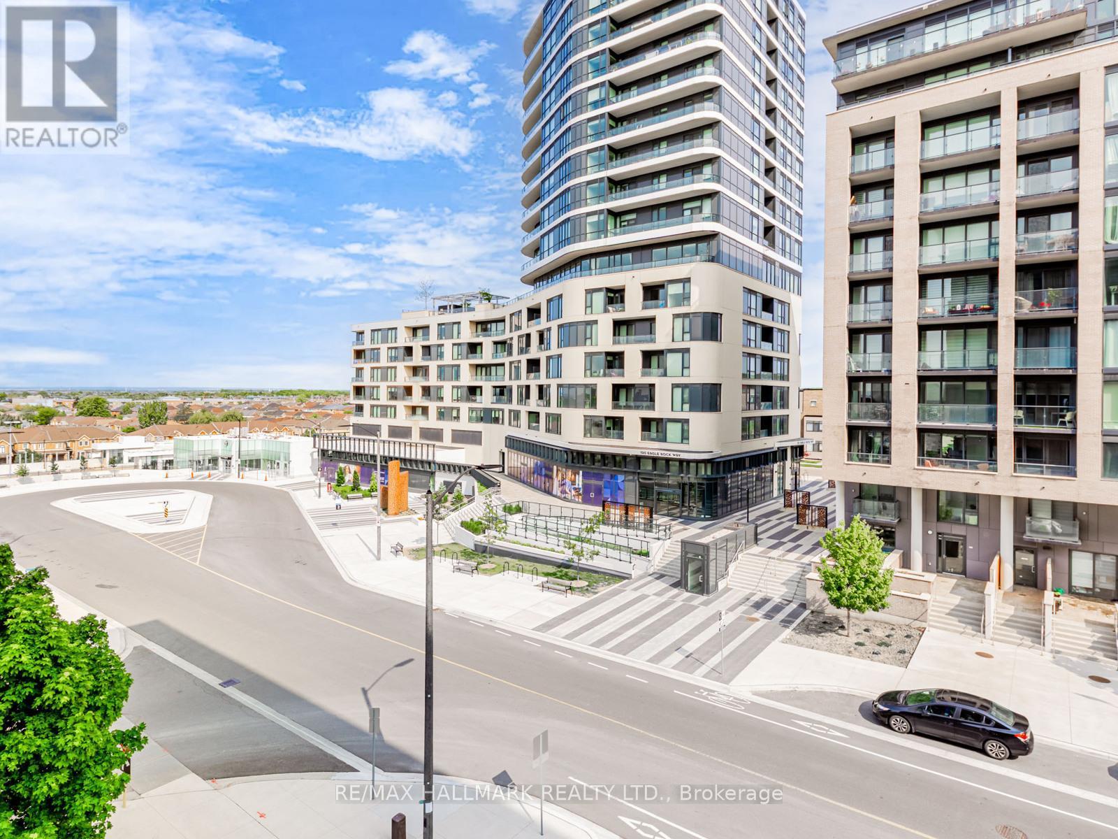 322 - 99 Eagle Rock Way, Vaughan, ON - Outdoor With Balcony With Facade