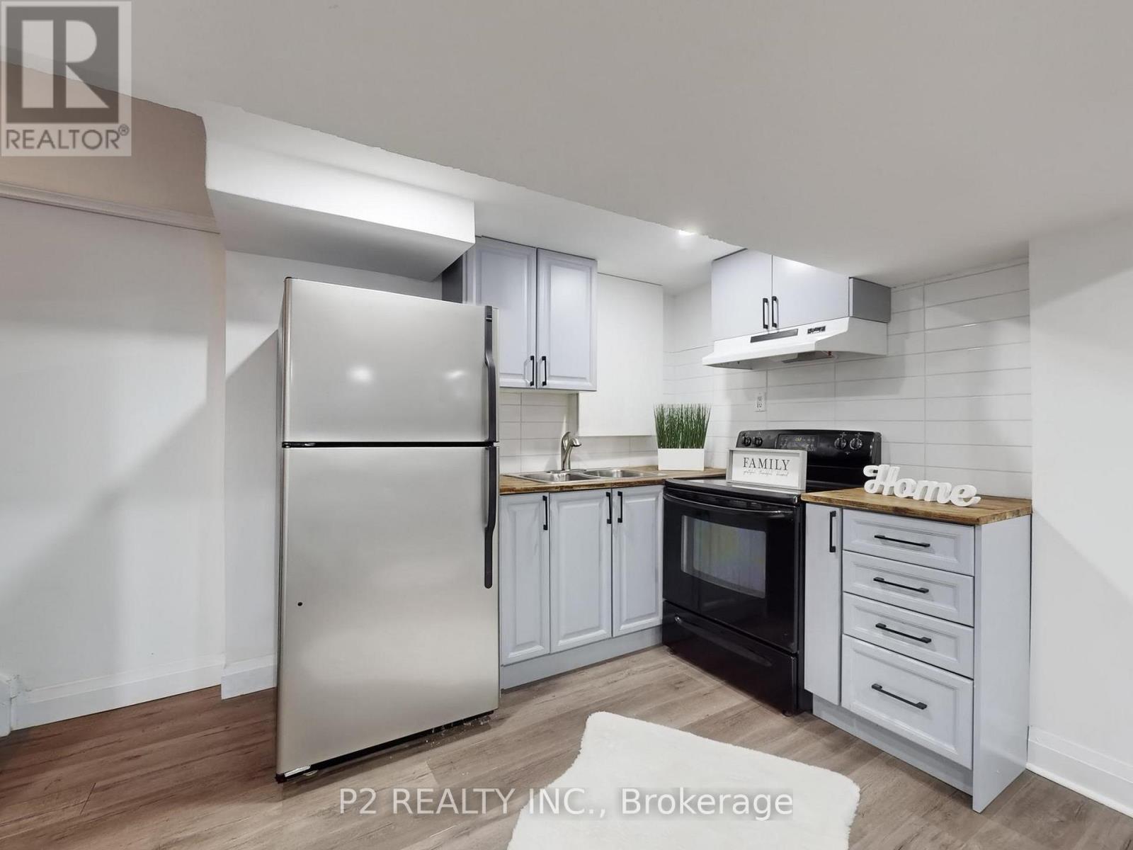 411 Rosedale Drive, Whitby, ON - Indoor Photo Showing Kitchen With Double Sink