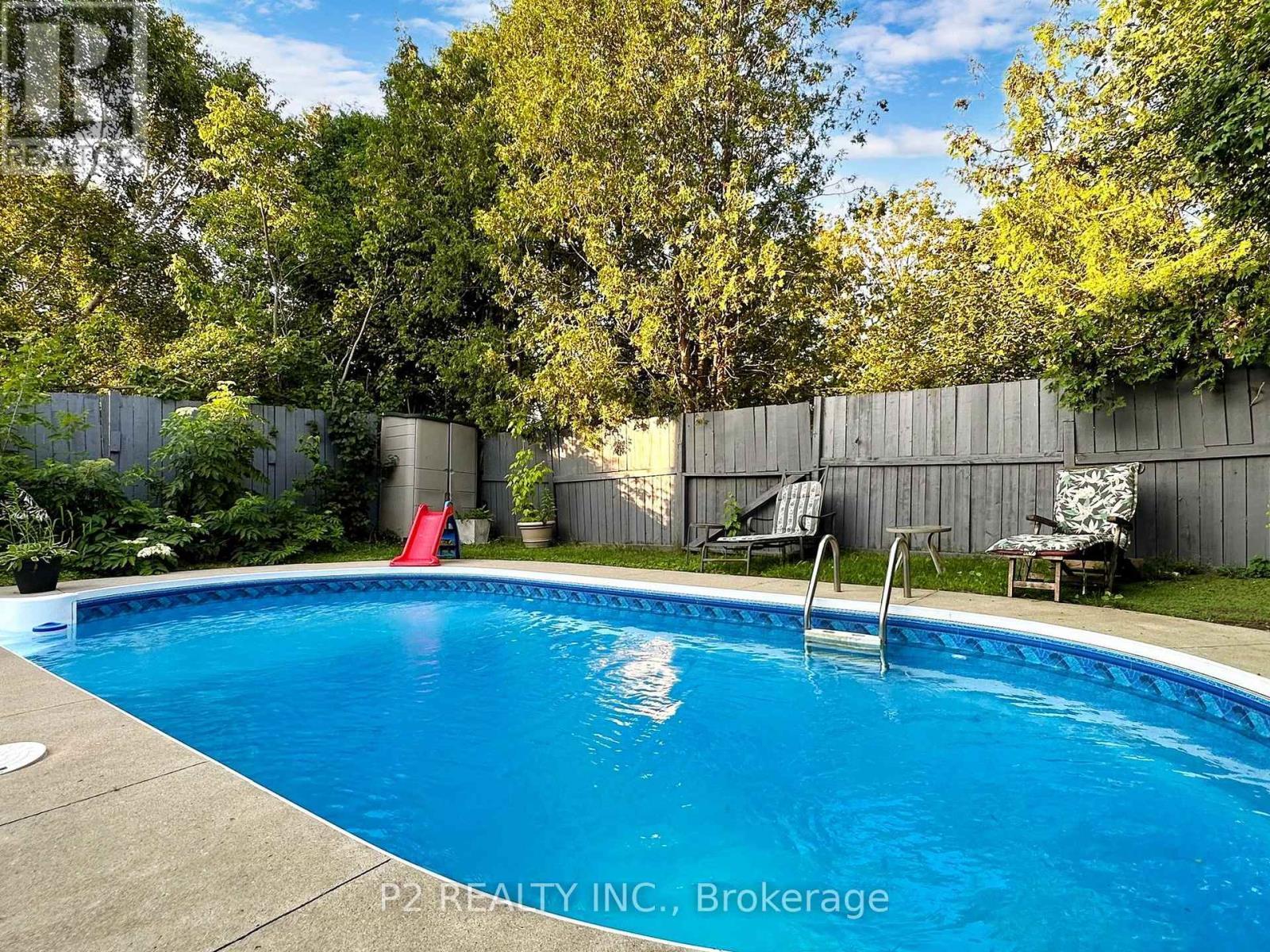411 Rosedale Drive, Whitby, ON - Outdoor With In Ground Pool With Backyard