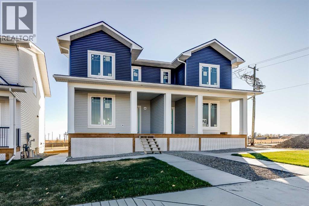 1905 Mccaskill Drive, Crossfield, AB - Outdoor With Deck Patio Veranda