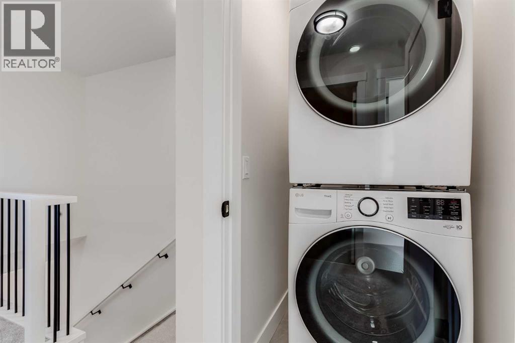 1905 Mccaskill Drive, Crossfield, AB - Indoor Photo Showing Laundry Room