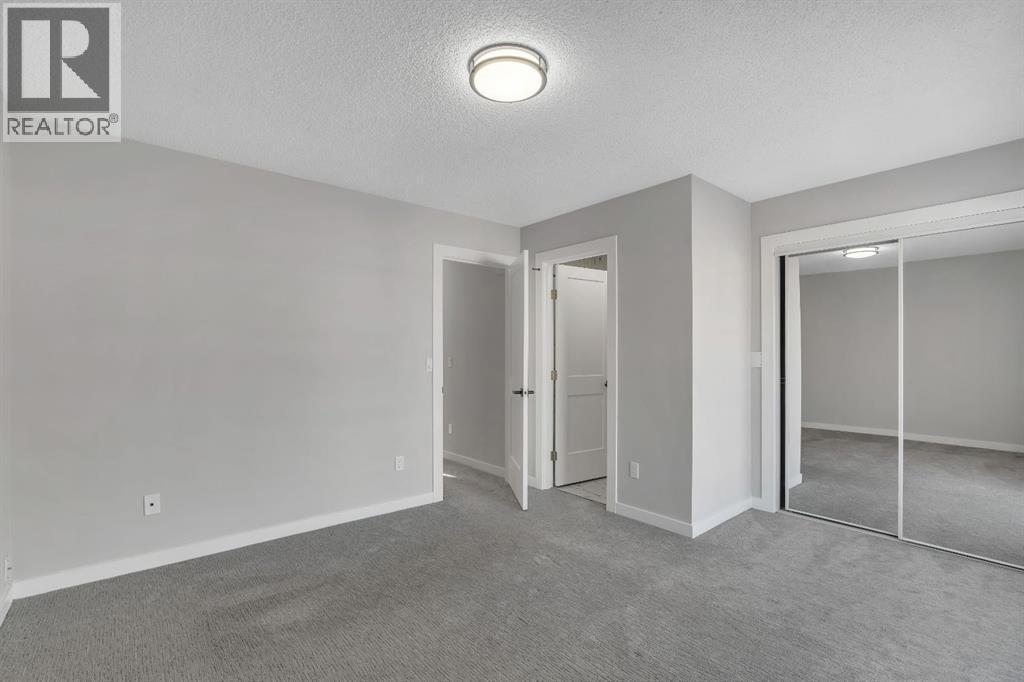 17 Mckernan Road Se, Calgary, AB - Indoor Photo Showing Other Room