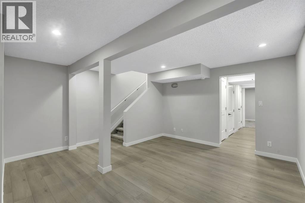 17 Mckernan Road Se, Calgary, AB - Indoor Photo Showing Other Room