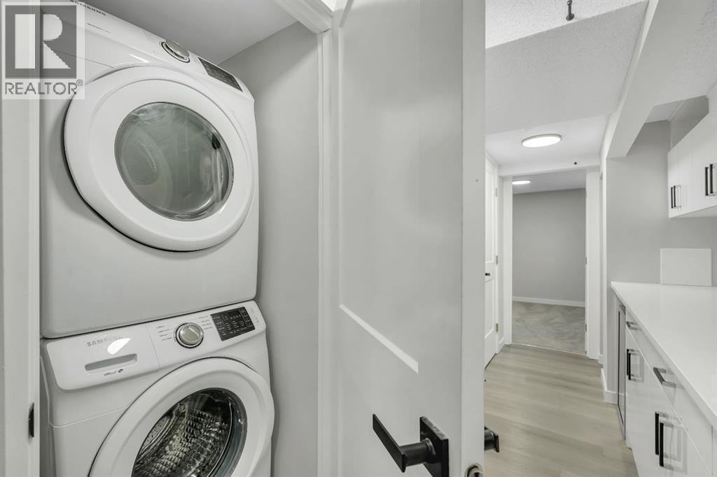 17 Mckernan Road Se, Calgary, AB - Indoor Photo Showing Laundry Room