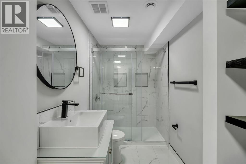 Basement bath - 17 Mckernan Road Se, Calgary, AB - Indoor Photo Showing Bathroom