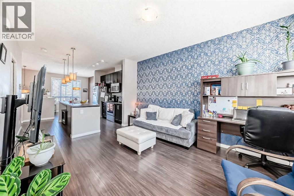 656 Copperpond Boulevard Se, Calgary, AB - Indoor Photo Showing Living Room