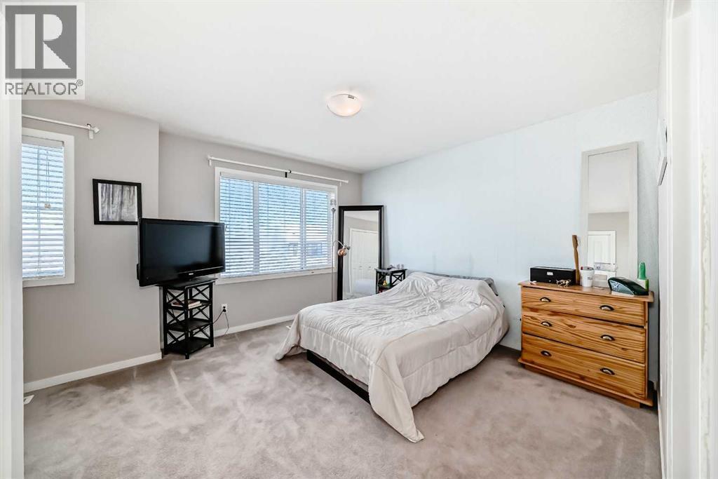 656 Copperpond Boulevard Se, Calgary, AB - Indoor Photo Showing Bedroom