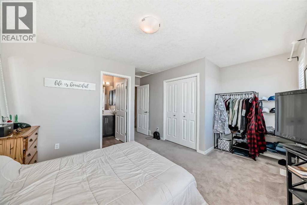 656 Copperpond Boulevard Se, Calgary, AB - Indoor Photo Showing Bedroom