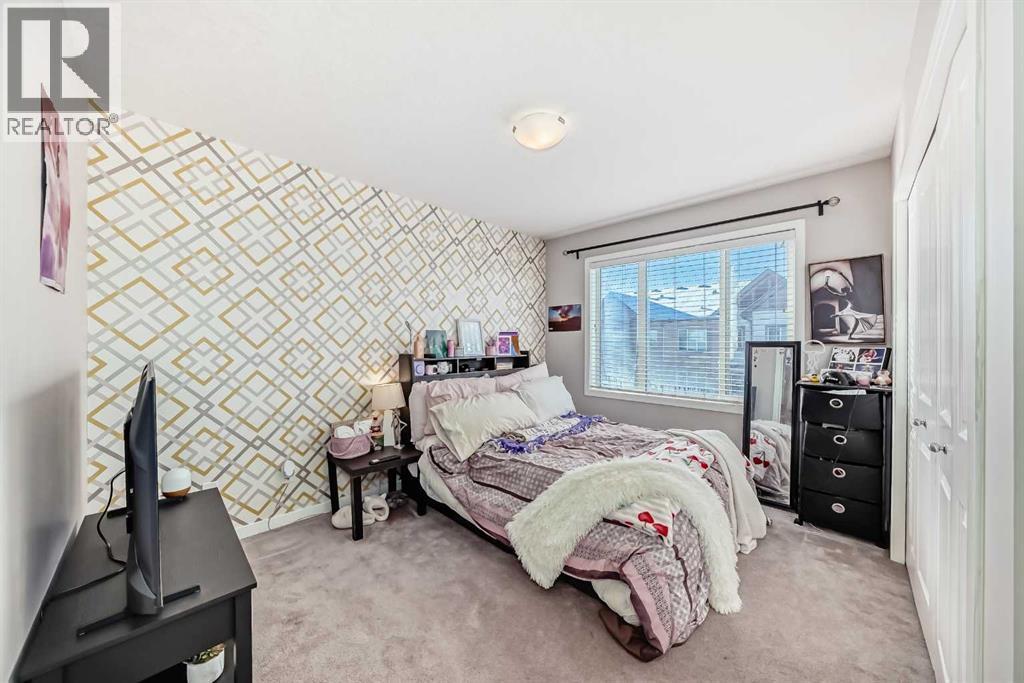 656 Copperpond Boulevard Se, Calgary, AB - Indoor Photo Showing Bedroom
