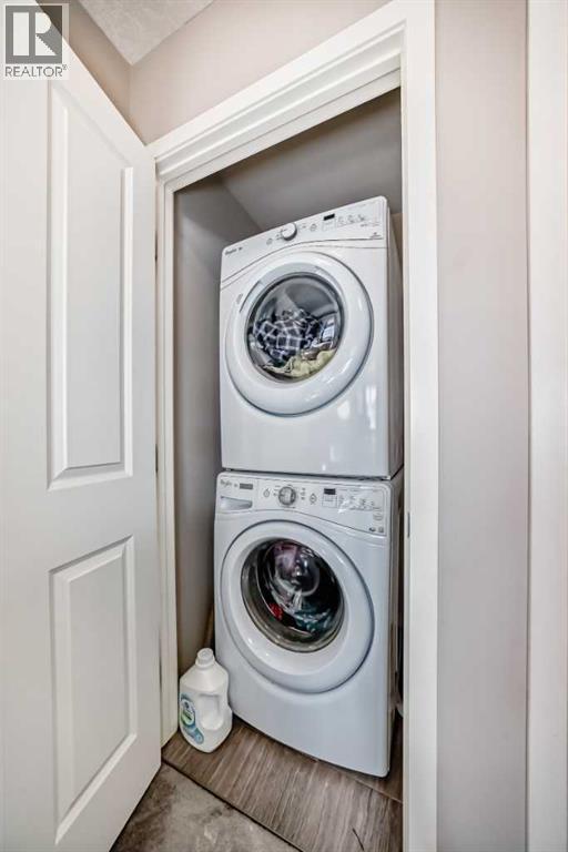 656 Copperpond Boulevard Se, Calgary, AB - Indoor Photo Showing Laundry Room