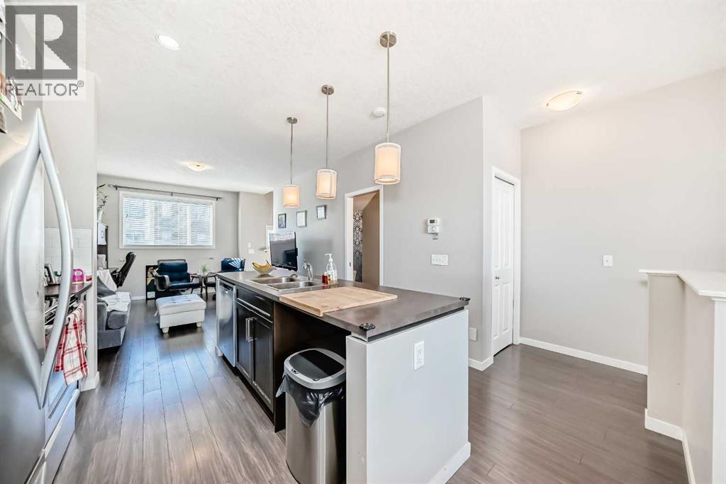 656 Copperpond Boulevard Se, Calgary, AB - Indoor Photo Showing Kitchen With Double Sink With Upgraded Kitchen